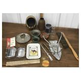 Ashtrays, coat hook, lighters, flower frogs, mug,