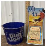 Colt 45 advertising calendar and Bud Light bucket