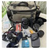 A photographers bundle.  Chinon camera with film,
