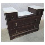 Step down marble top dresser