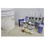 Caulk, oil, mineral spirits, putty all new not