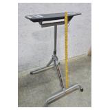 Rigid flip top work support