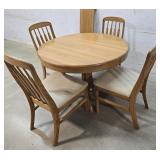 Keller mfg round oak table, 4 chairs, 1 leaf