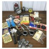 Flashlight, tape measure, sandpaper, hammer,