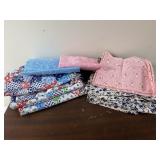 Group of old fabric. Feed sacks (some cut)