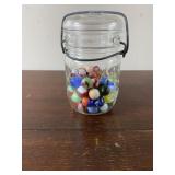 vintage pint canning jar with glass marbles.