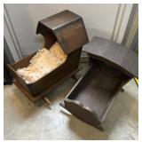 2 Primitive doll cradles. One with ï¿½beddingï¿½
