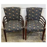 Pair of elephant motif upholstered arm chairs