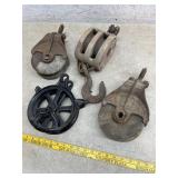 Four Large Pulleys