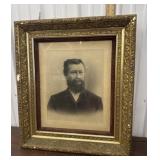 Gold gilded framed portrait, man with beard