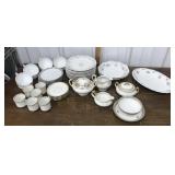 Plates, bowls, sugar, creamer, cups &  saucers