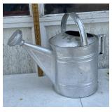 Galvanized watering can