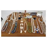Costume jewelry necklaces, bracelets, earrings,