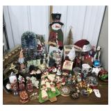 Christmas ornaments, figures etc in green tub