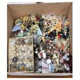 Costume jewelry earrings, belt, etc large lot