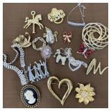 Brooches, bracelet, and necklaces