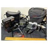 Pantex and Polaroid cameras. With flash