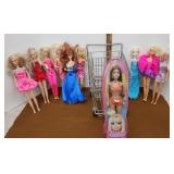 Toy grocery cart and Barbie doll etc