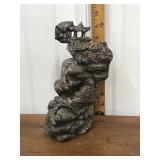 Carved fossilized sculpture *has been repaired