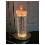 Flickering candle stick glitter motion light