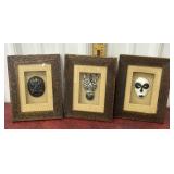Carved shadow box frames masks and zebra
