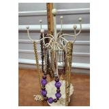 Jewelry display with costume jewelry necklaces