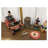 Metal car, cast iron bank, clown, jacks, airplane