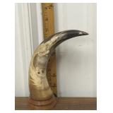 Carved horn- dragon, wood base