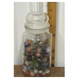 Planters Peanuts jar w/ marbles- some marbles