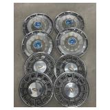 2 sets of 4 Chevrolet hubcaps