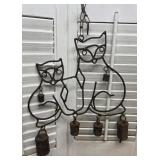 Rusty old cat wind chimes