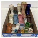 Flat of decorative shoes and boots - some have