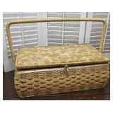 Vintage yellow sewing basket with contents