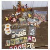 Box of tiny dolls, books, cookie cutters, records