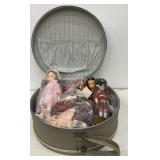 Dolls in carrying case