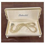Deknatel case with string of pearls??? Sterling