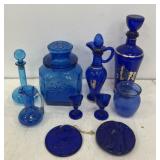 Blue glass - one eye wash has a chip