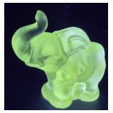 Glow green glass elephant paperweight - glows