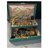 Jewelry box of  vintage jewelry, broaches