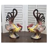 Pair rooster figurines - one has been repaired