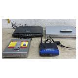 Linksys Router, Phillips & Coby Dvd Players &