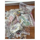 Bagged costume jewelry necklaces etc