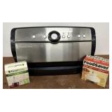 FoodSaver- comes with 2 jar sealers - turns on