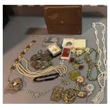 Treasure chest box of vintage jewelry, necklaces,