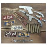 Toy guns, license plates, charm bracelet etc