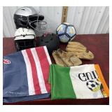 Sports helmets, baseball gloves and Redbull and