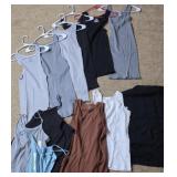 12 tank tops - size L-Xl appear to be new