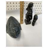 Marble mask, and ebony figures