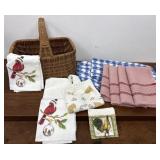 Vintage basket with linens. 2 blue & white lined