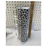 Set of mugs in a rack